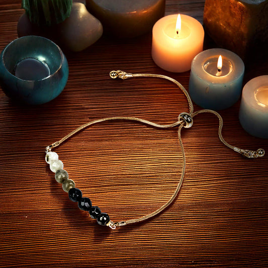 Pulseira de Proteção: Pulseira ajustável em tom dourado com Pedra da Lua, Labradorite, Quartzo Fumado e Hematite Magnética